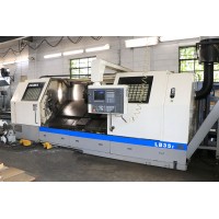 OKUMA MODEL LB-35/2000 CNC TURNING CENTER 27.56" SWING x 78.74"cc w/OSP 7000L Control w/IGF, 1995
