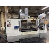 HAAS VF-6/50 VERTICAL MACHINING CENTER; 2004; CAT 50 SPINDLE, COOLANT THROUGH SPINDLE, RENISHAW PROBE, CHIP AUGER; INSPECT UNDER POWER IN PA